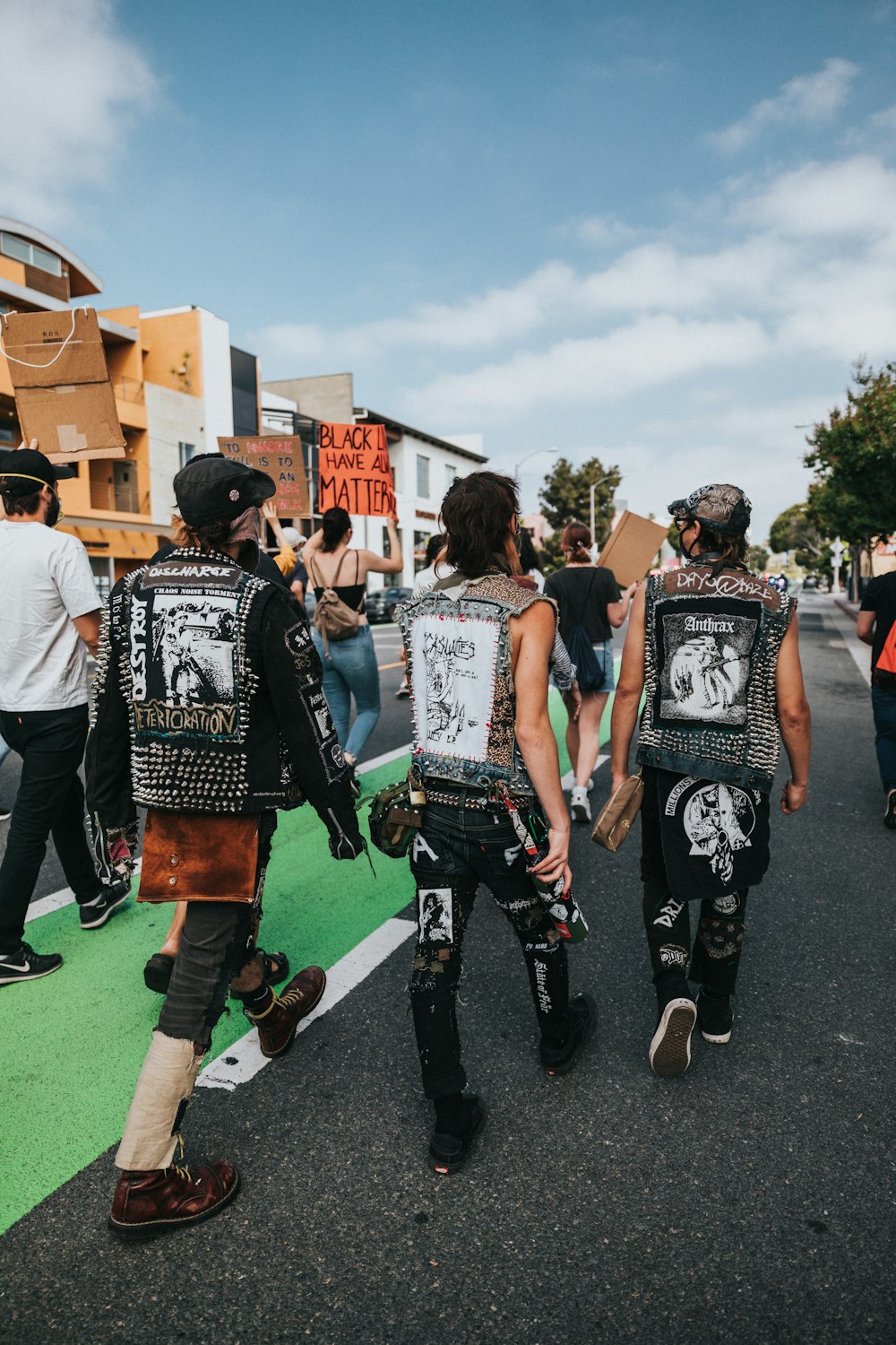 group of people walking on street during daytime