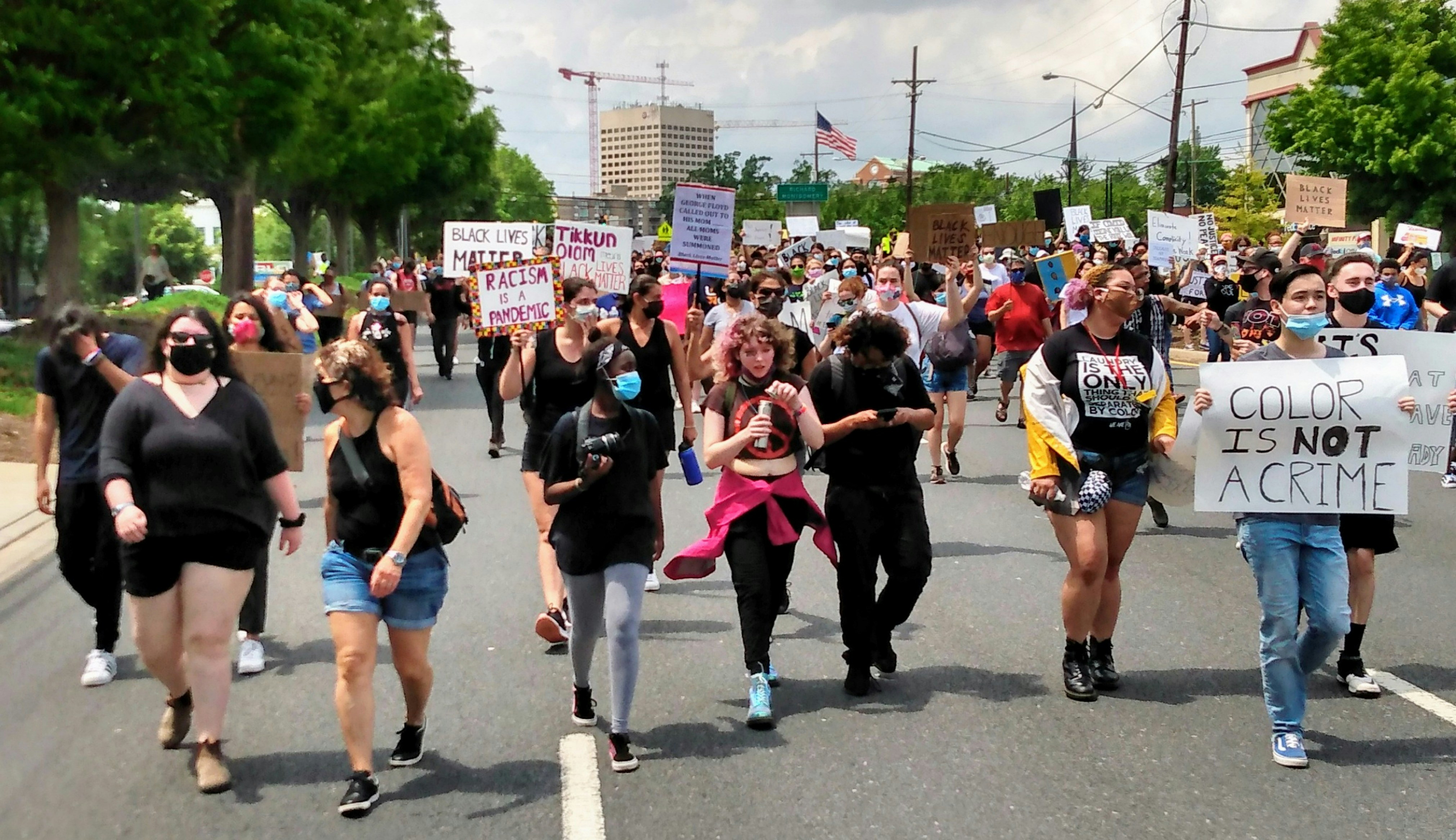 Demonstrators march down a busy street during George Floyd protest on June 5, 2020, in Rockville, Maryland. #GeorgeFloyd #BlackLivesMatter