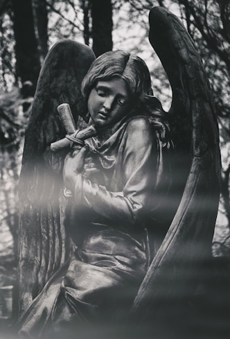 woman in black dress statue
