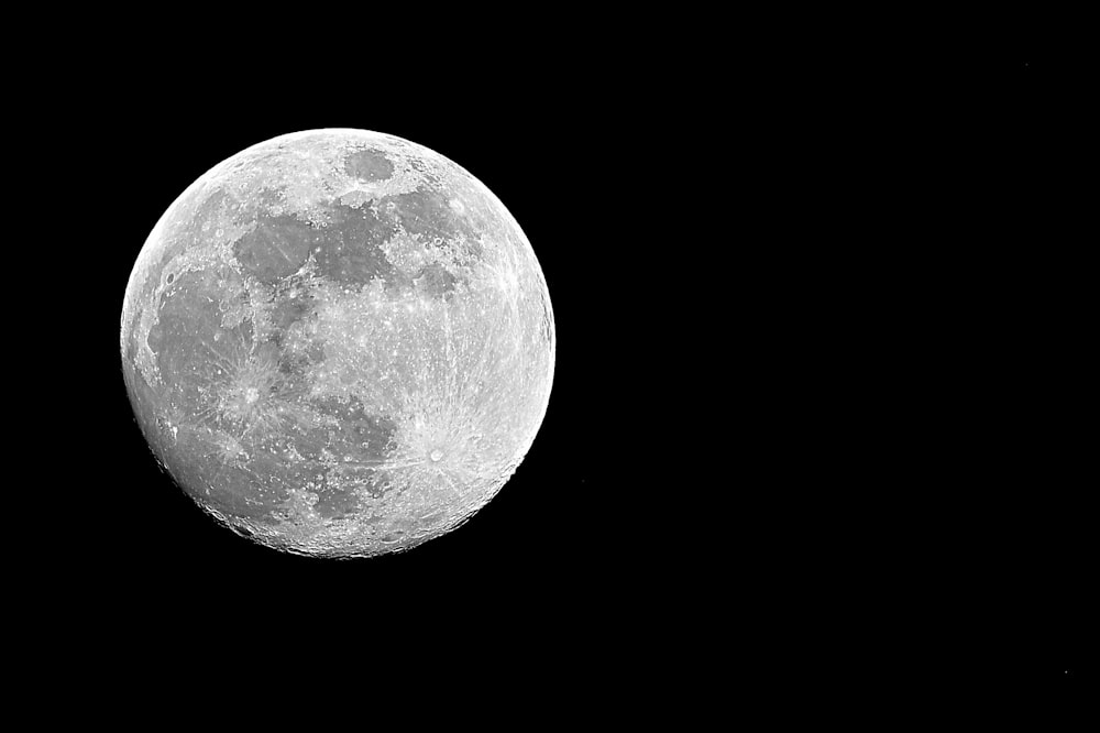 grayscale photo of full moon