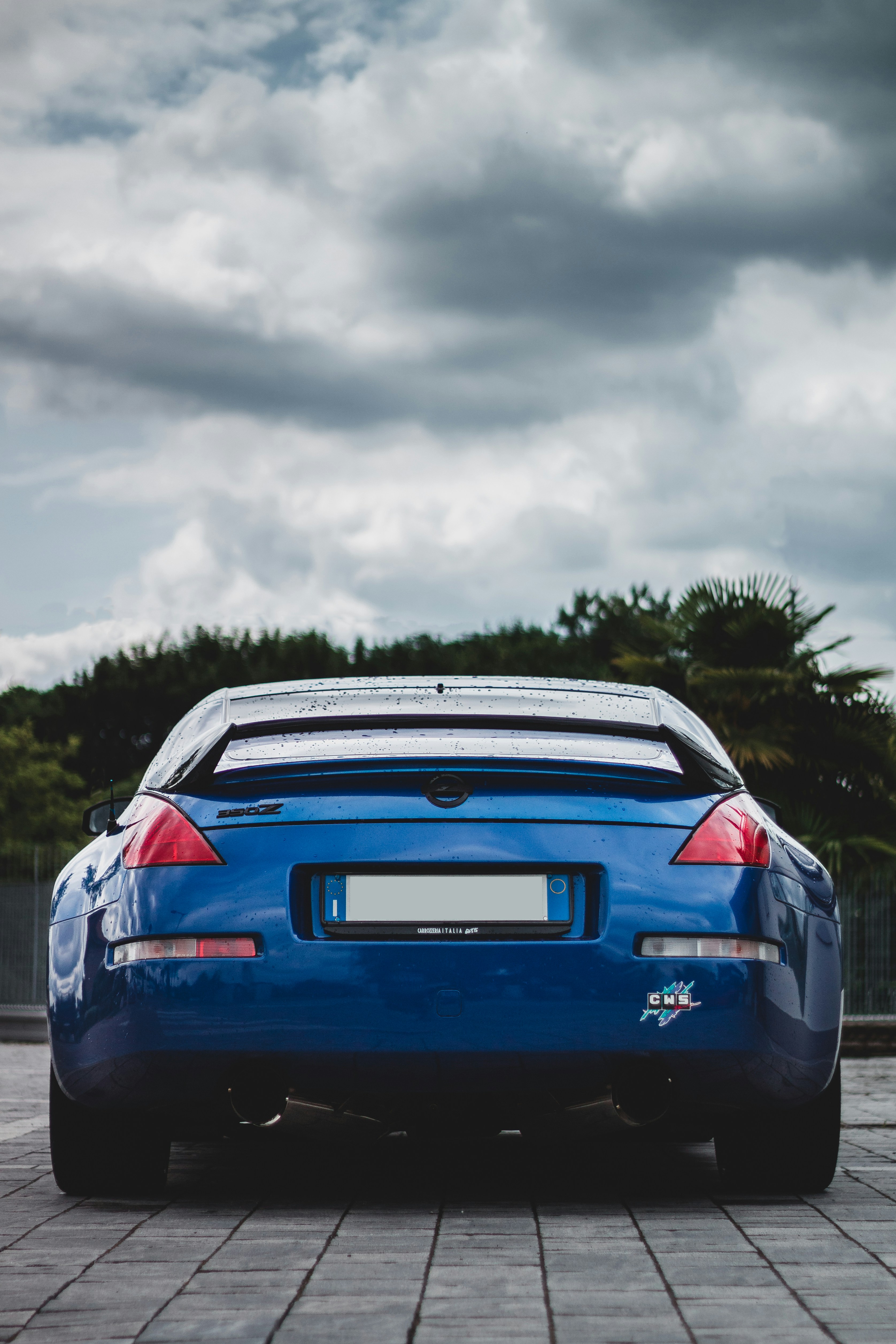blue bmw m 3 on road during daytime