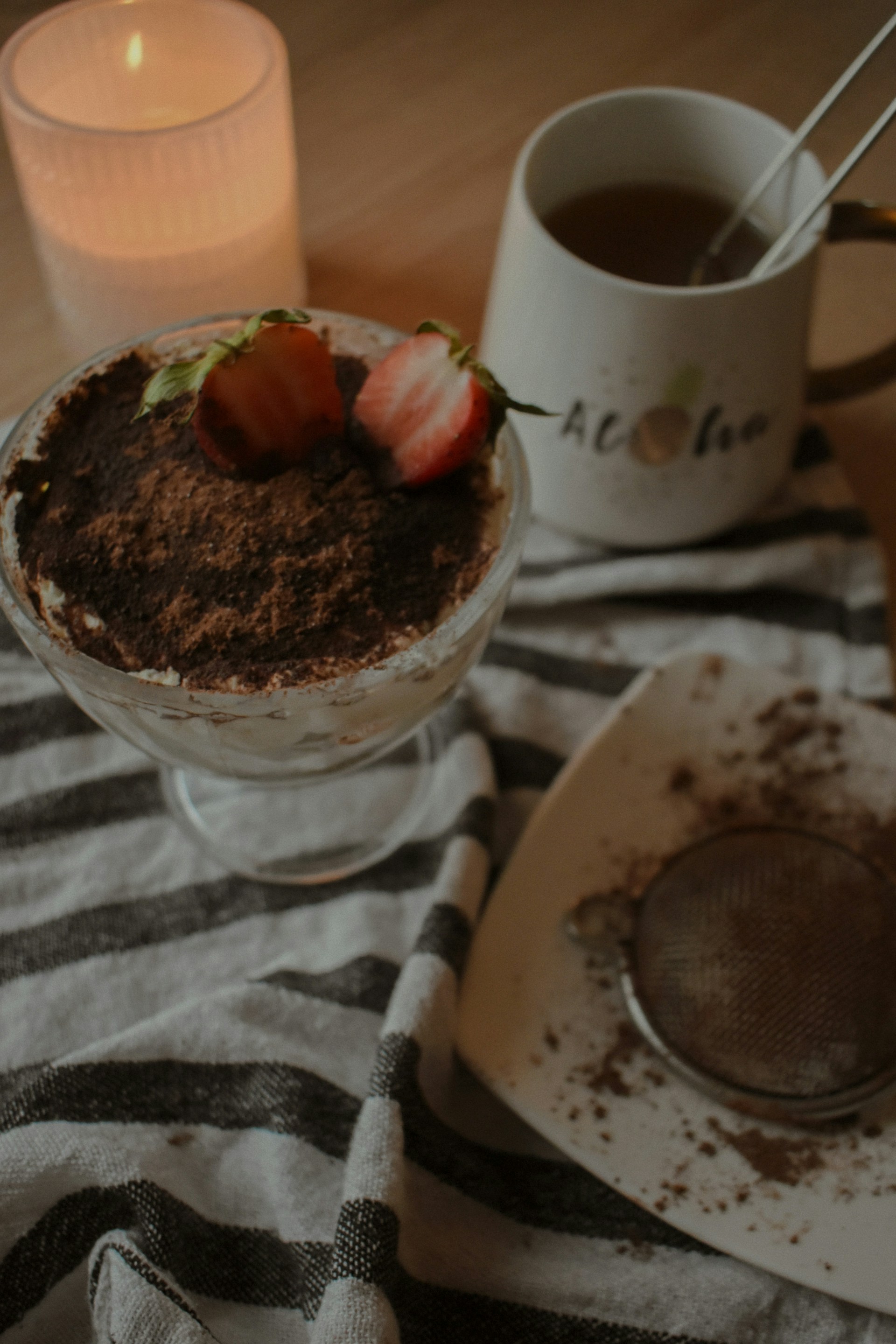 clear drinking glass with brown liquid