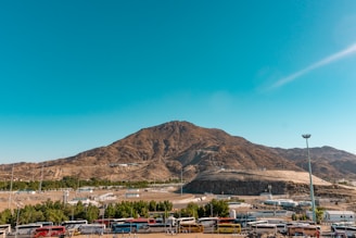 brown mountain under blue sky during daytime