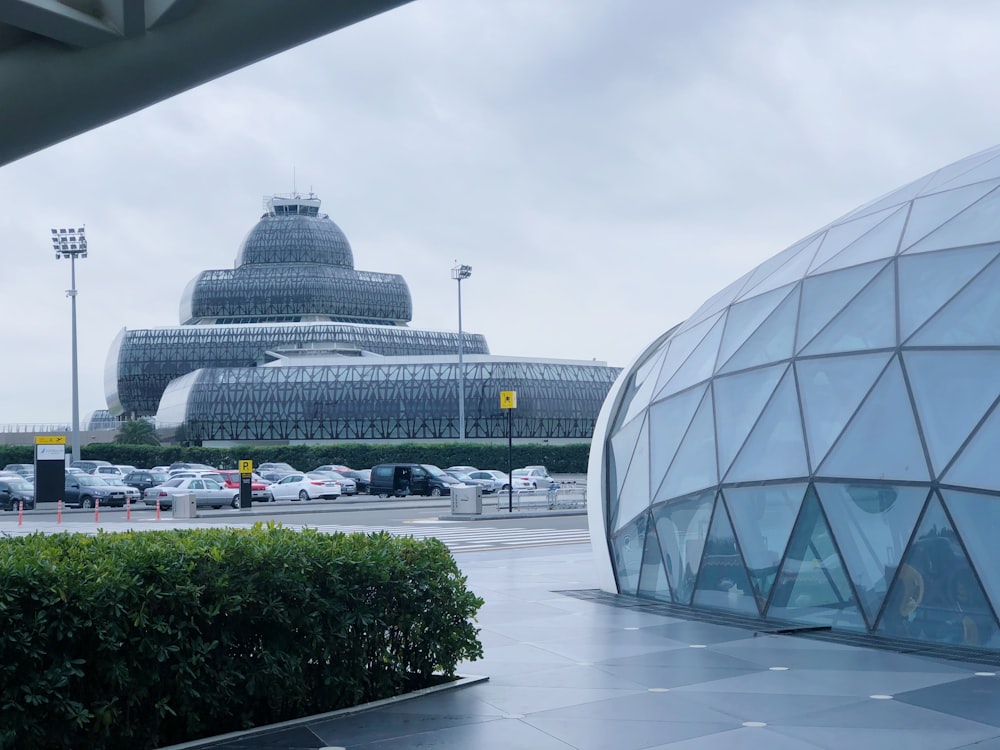 people walking near glass building during daytime