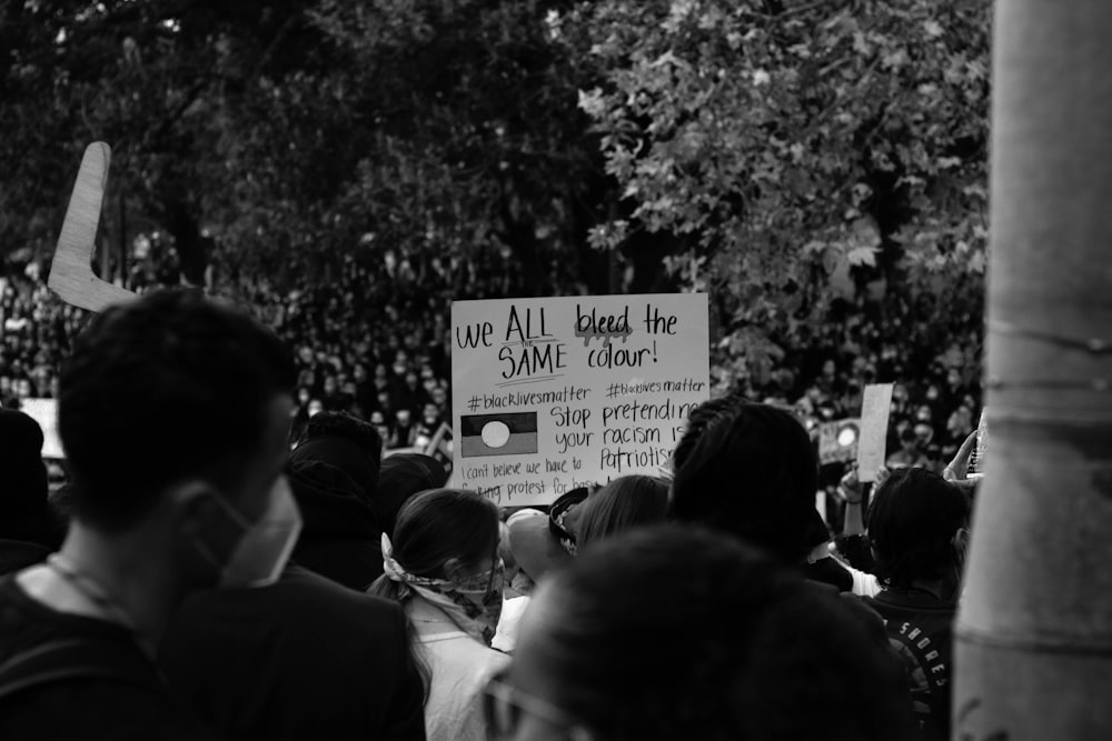 grayscale photo of people walking on street