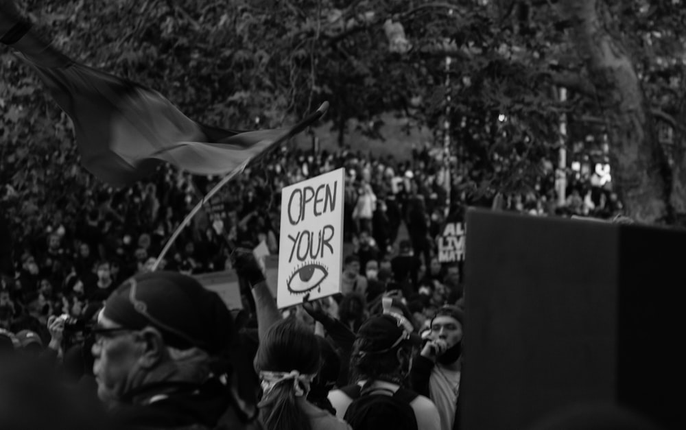 grayscale photo of people in the park