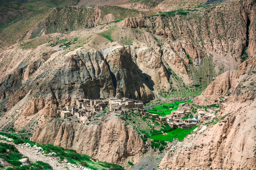 aerial view of houses on mountain during daytime