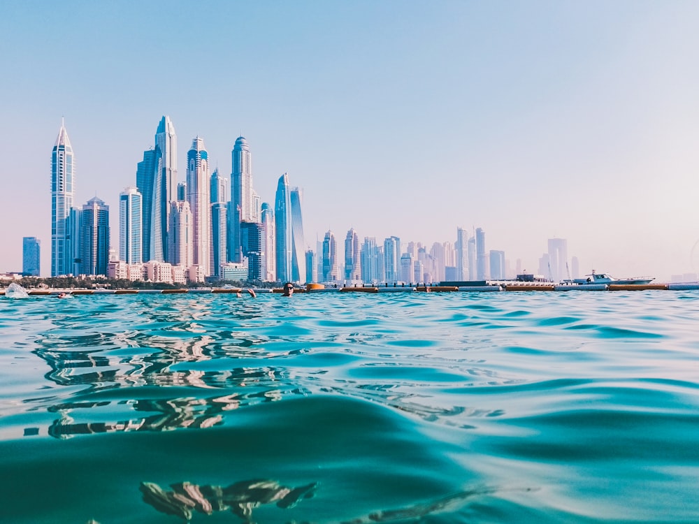 city skyline under blue sky during daytime