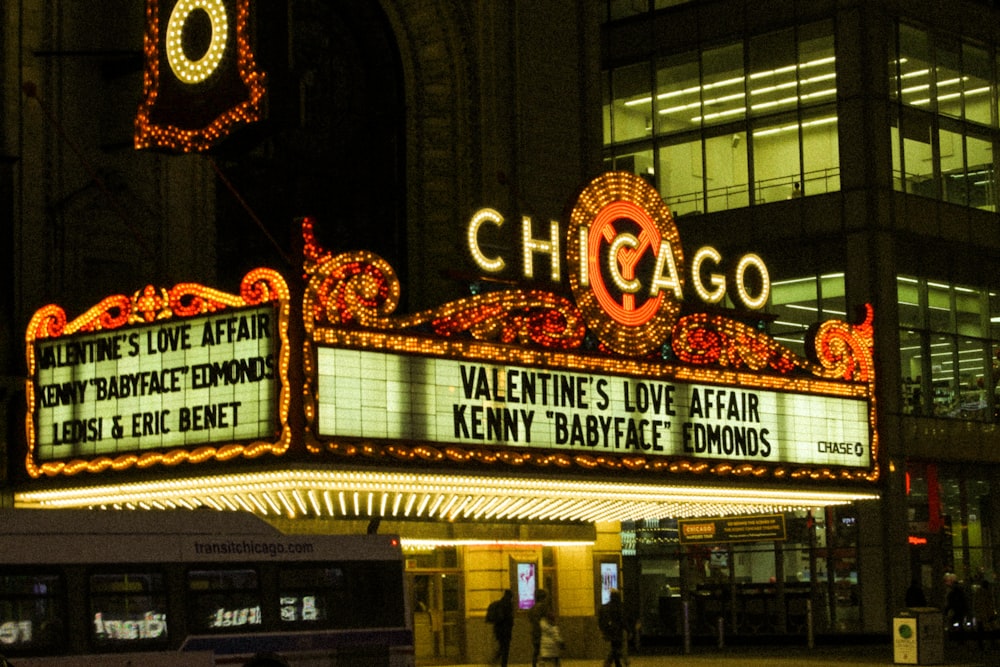 the chicago theatre marquee is lit up at night