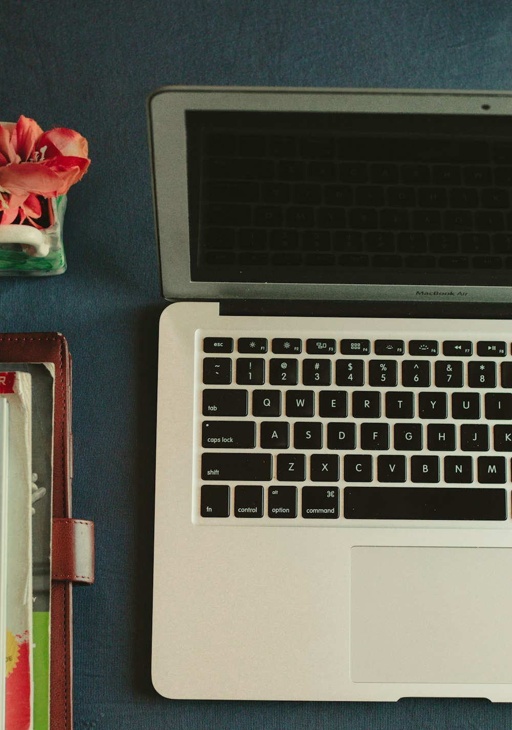 macbook pro on white table