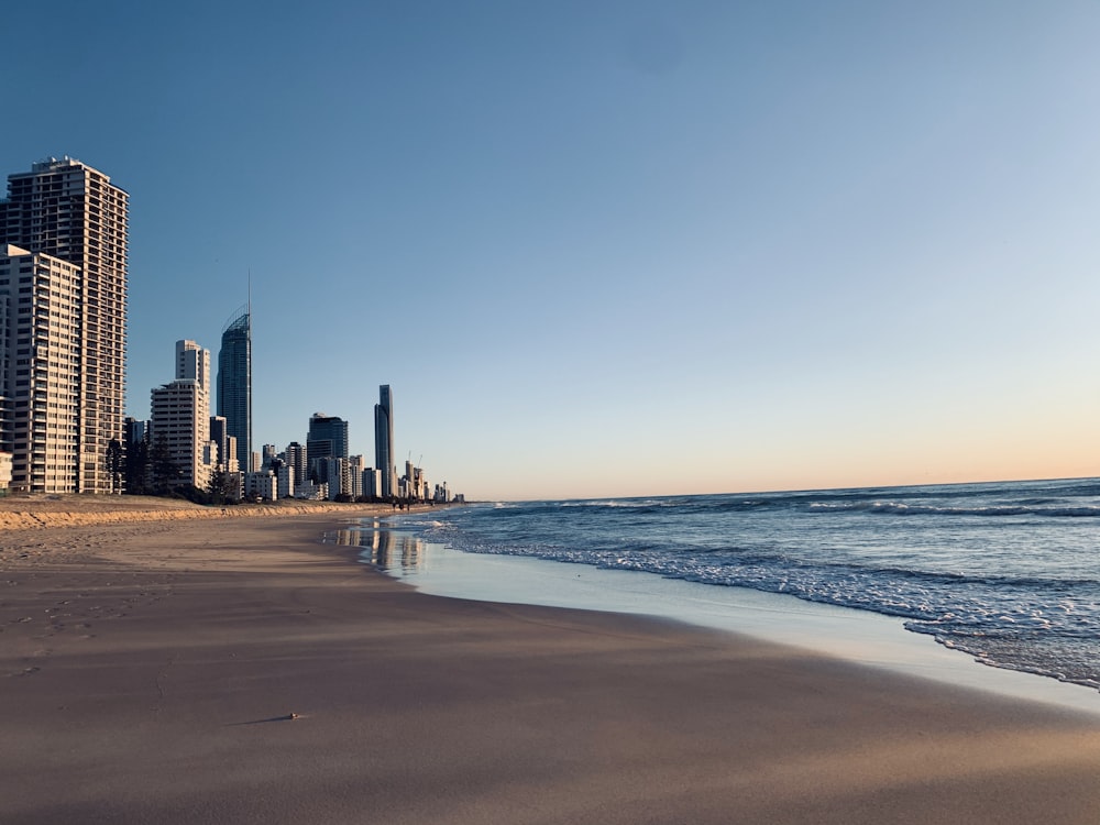 city skyline across the sea during daytime