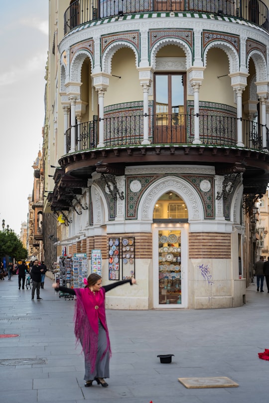 people walking on sidewalk near building during daytime in Adriática Building Spain