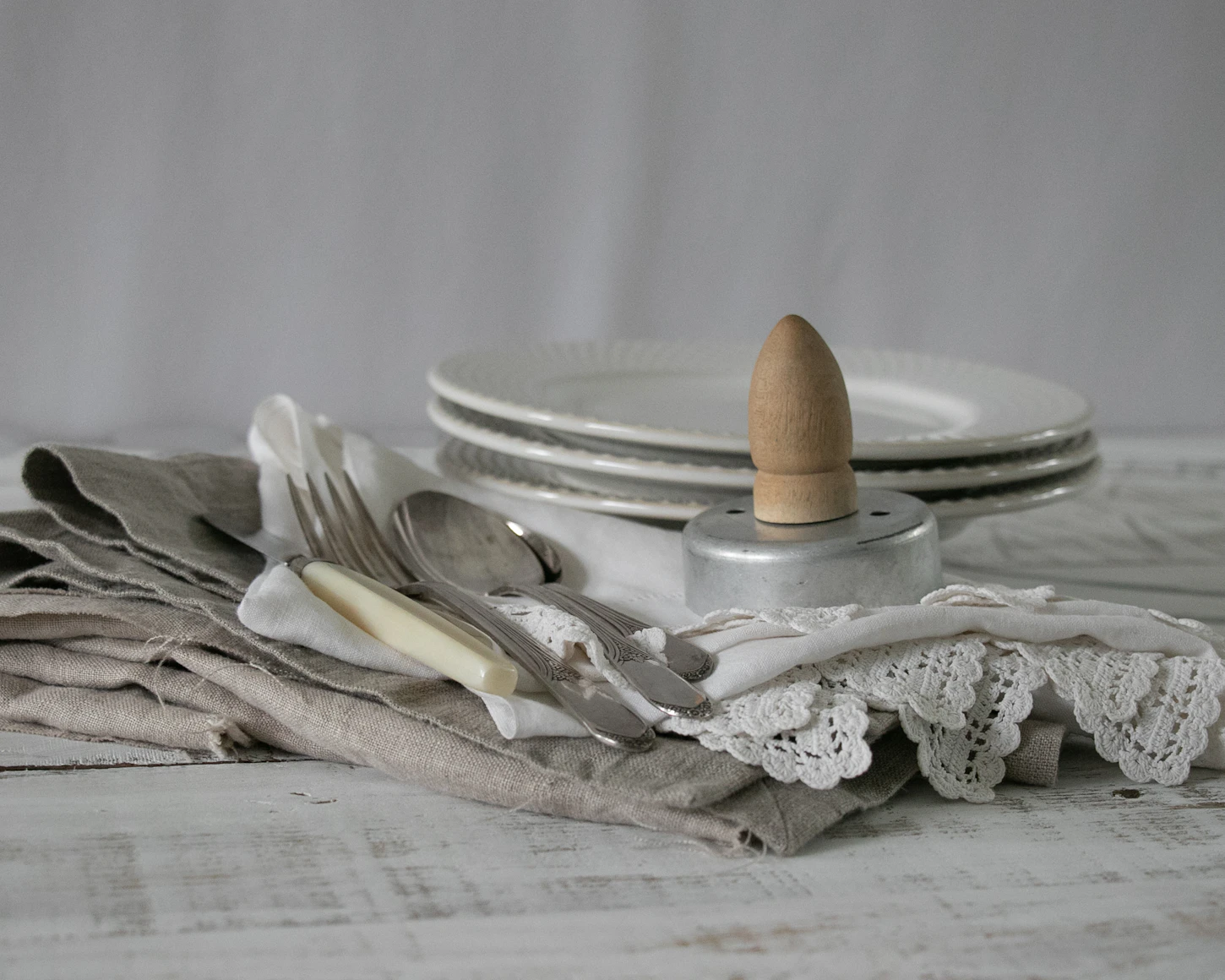 A beautifully set table with hand-printed linens