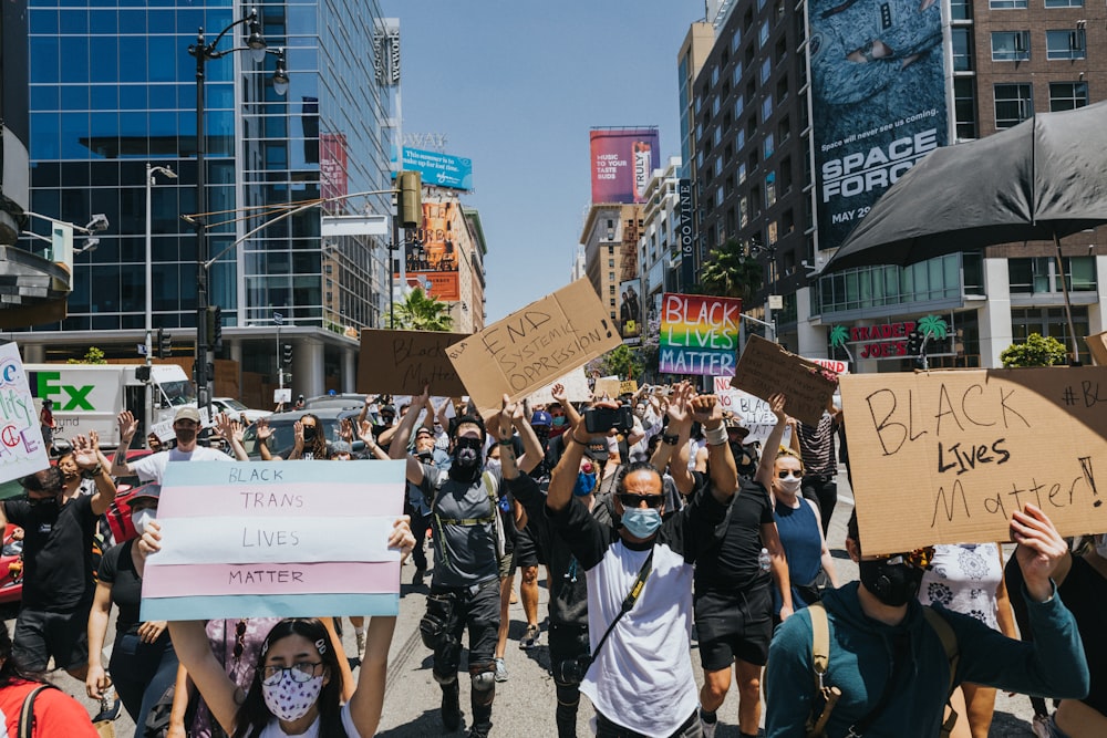 people standing on street during daytime