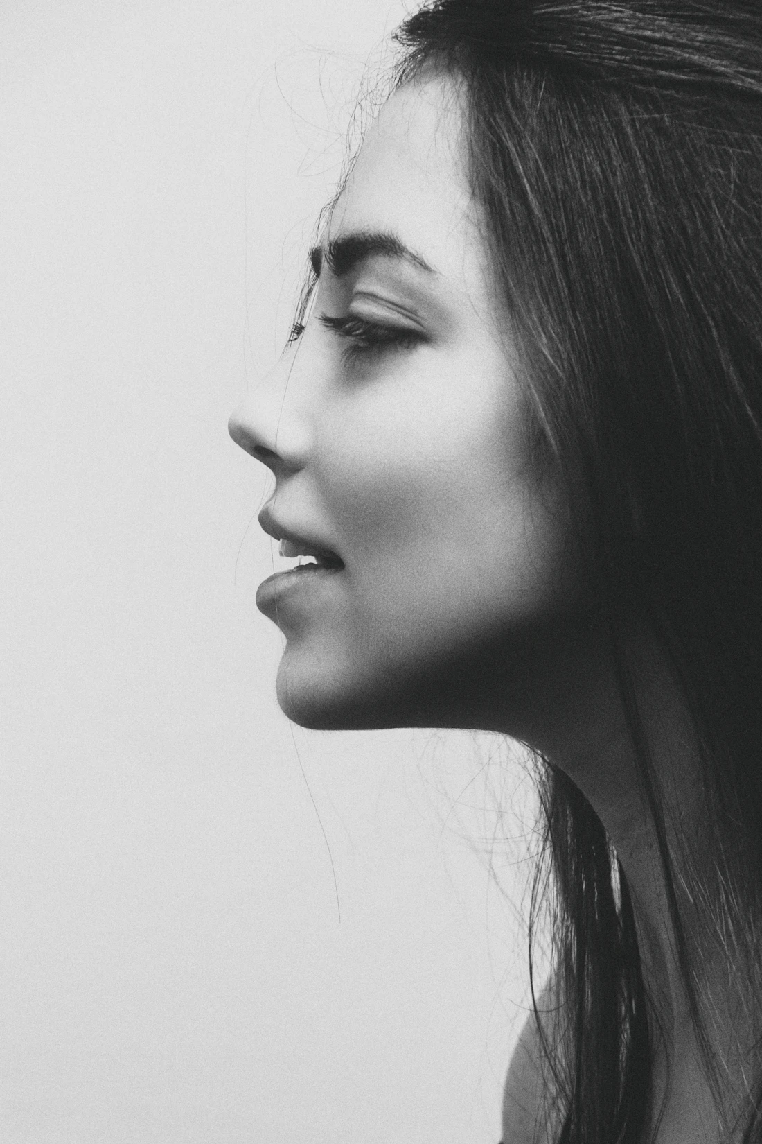 Grayscale editorial portrait emphasising jawline definition