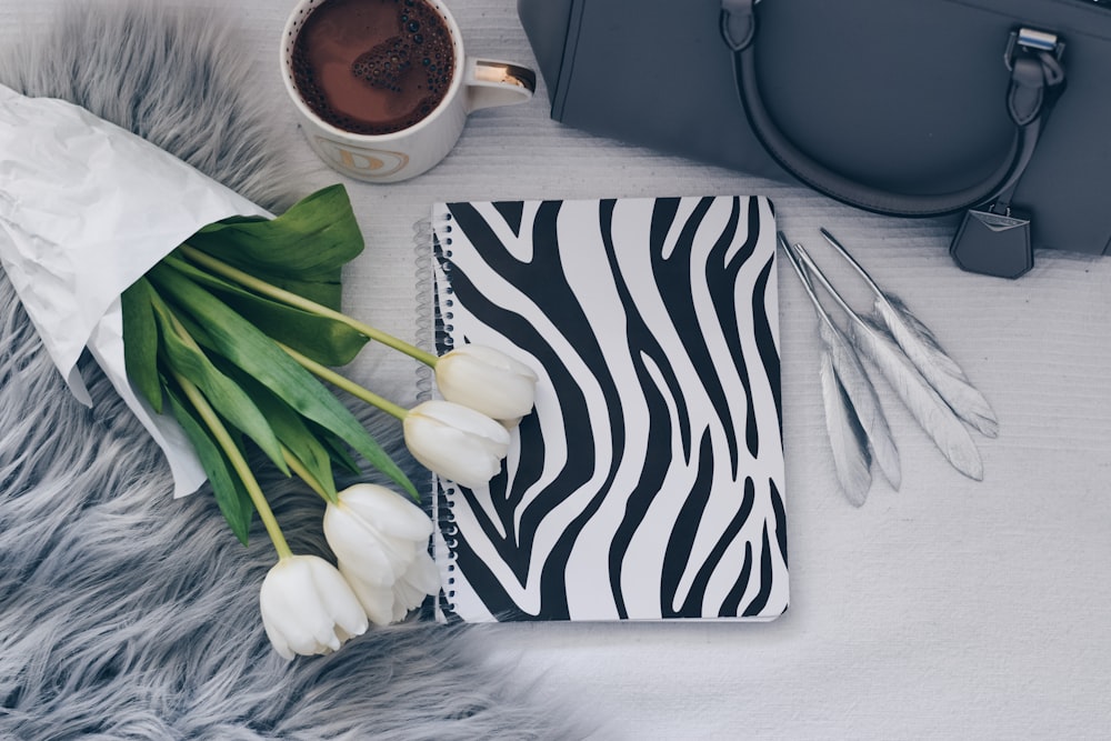 white garlic on black and white zebra print textile