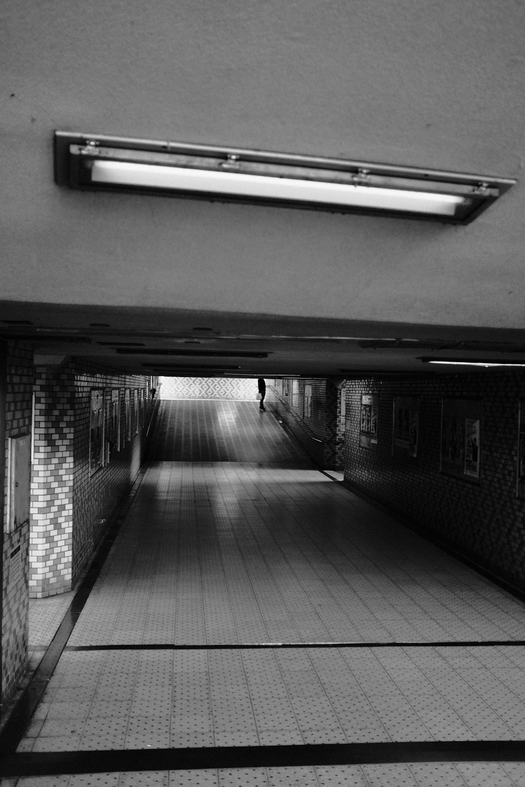 grayscale photo of empty hallway