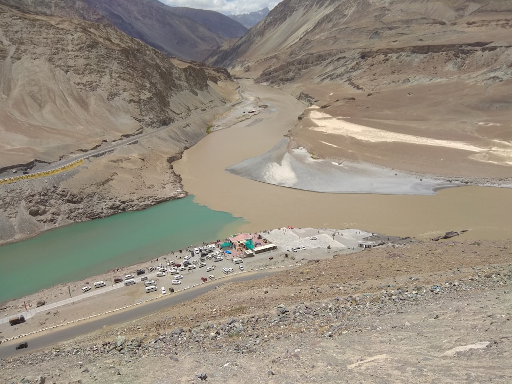 aerial view of lake and mountains during daytime