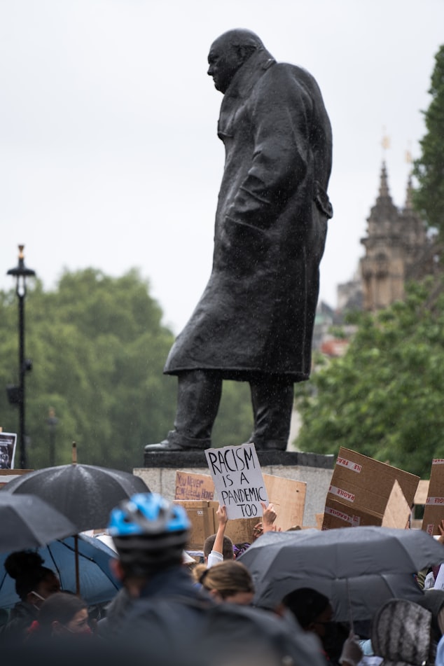 The statue of Winston Churchill in London, UK, surrounded by Black Lives Matter protestors.