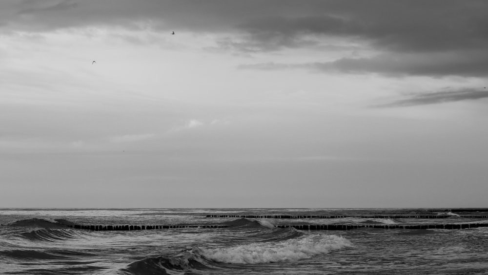 grayscale photo of ocean waves