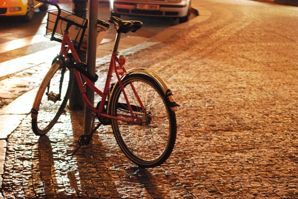 black city bike on brown sand