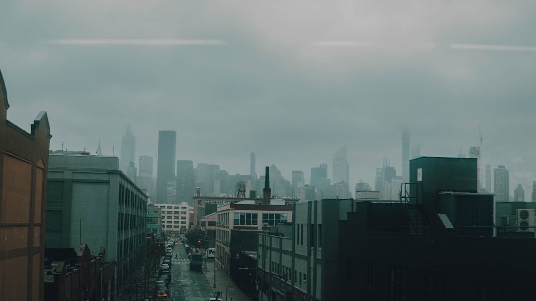 city buildings under white sky during daytime