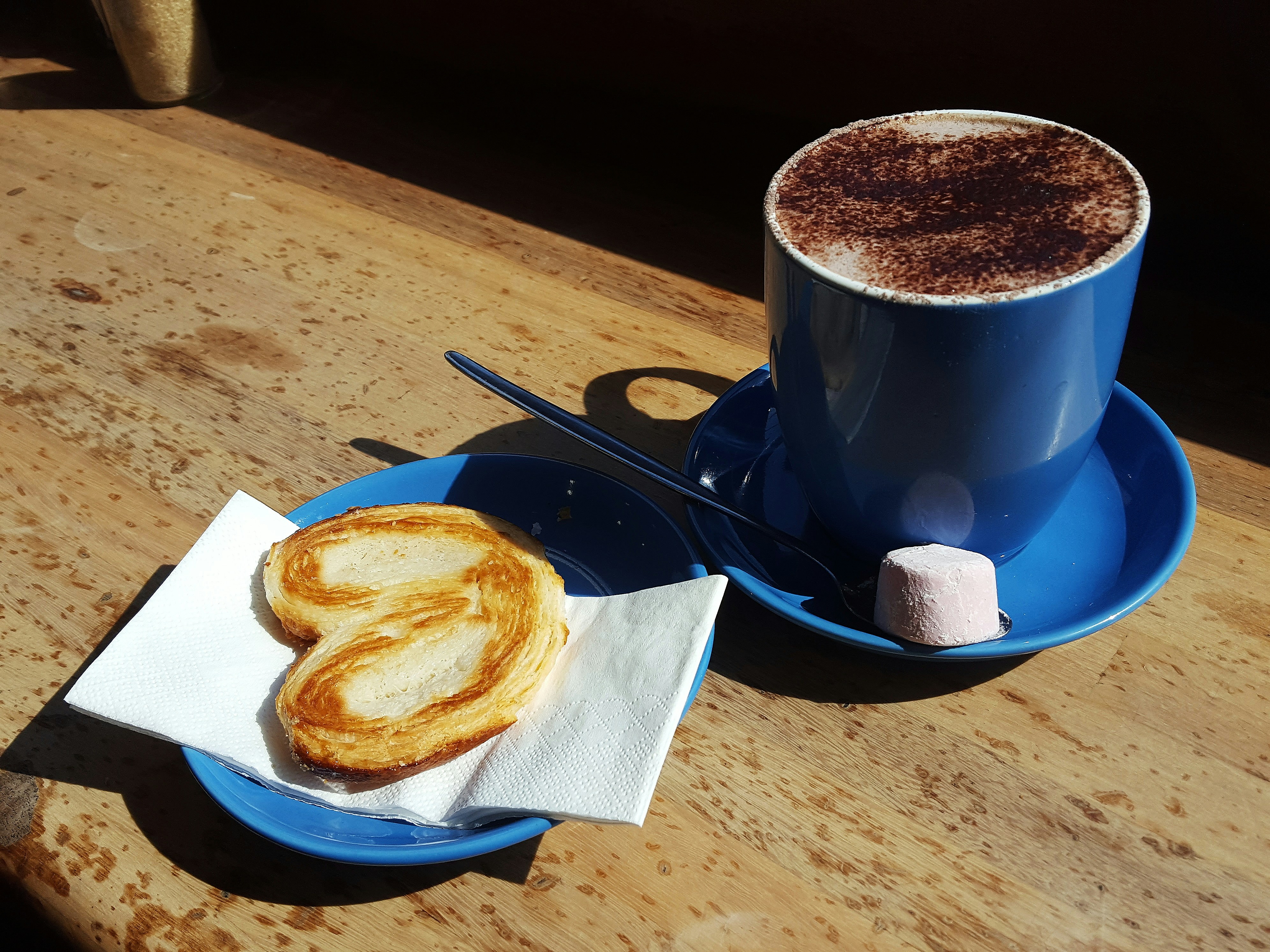 white ceramic mug on white ceramic saucer