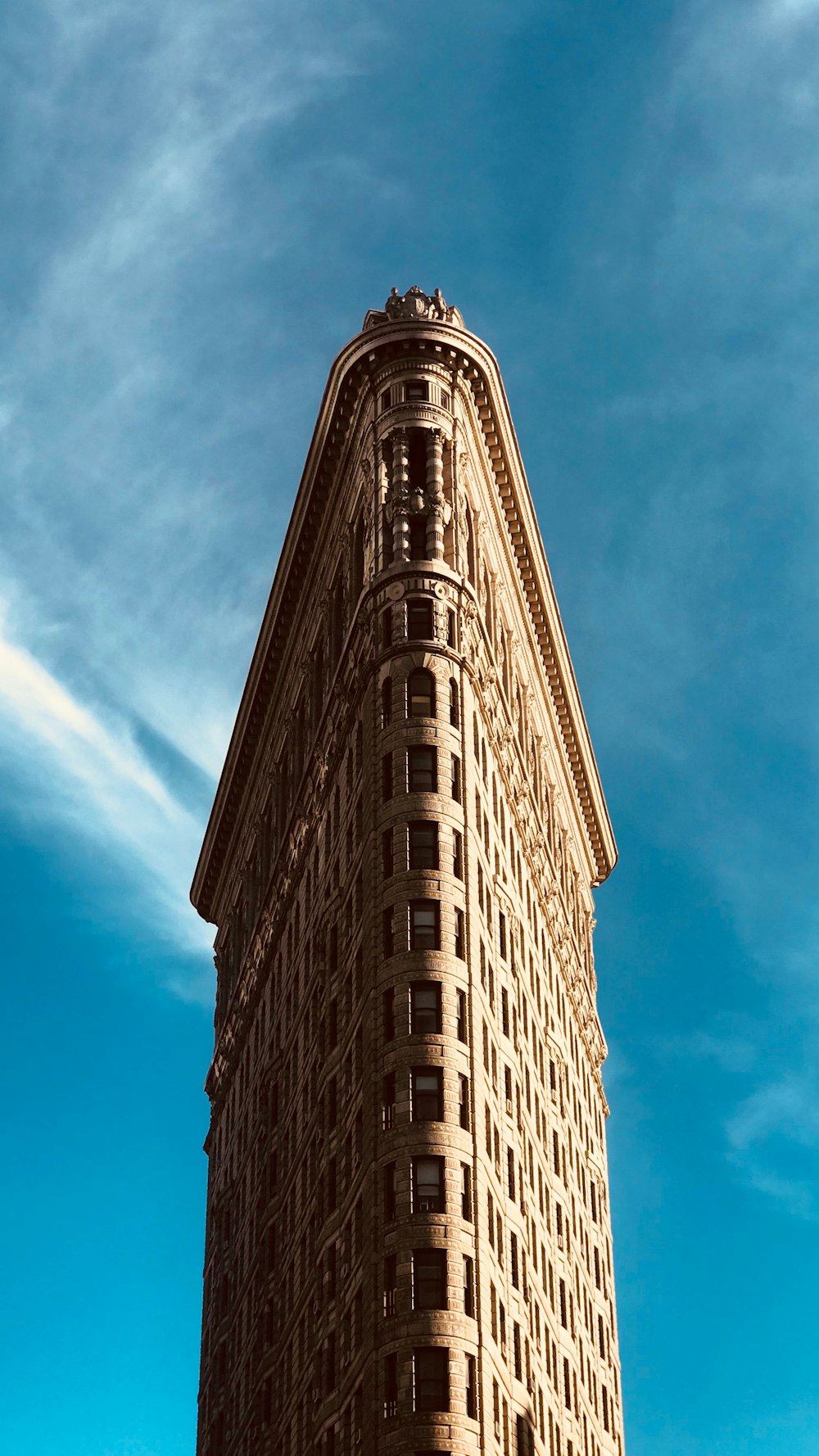 brown concrete building under blue sky during daytime