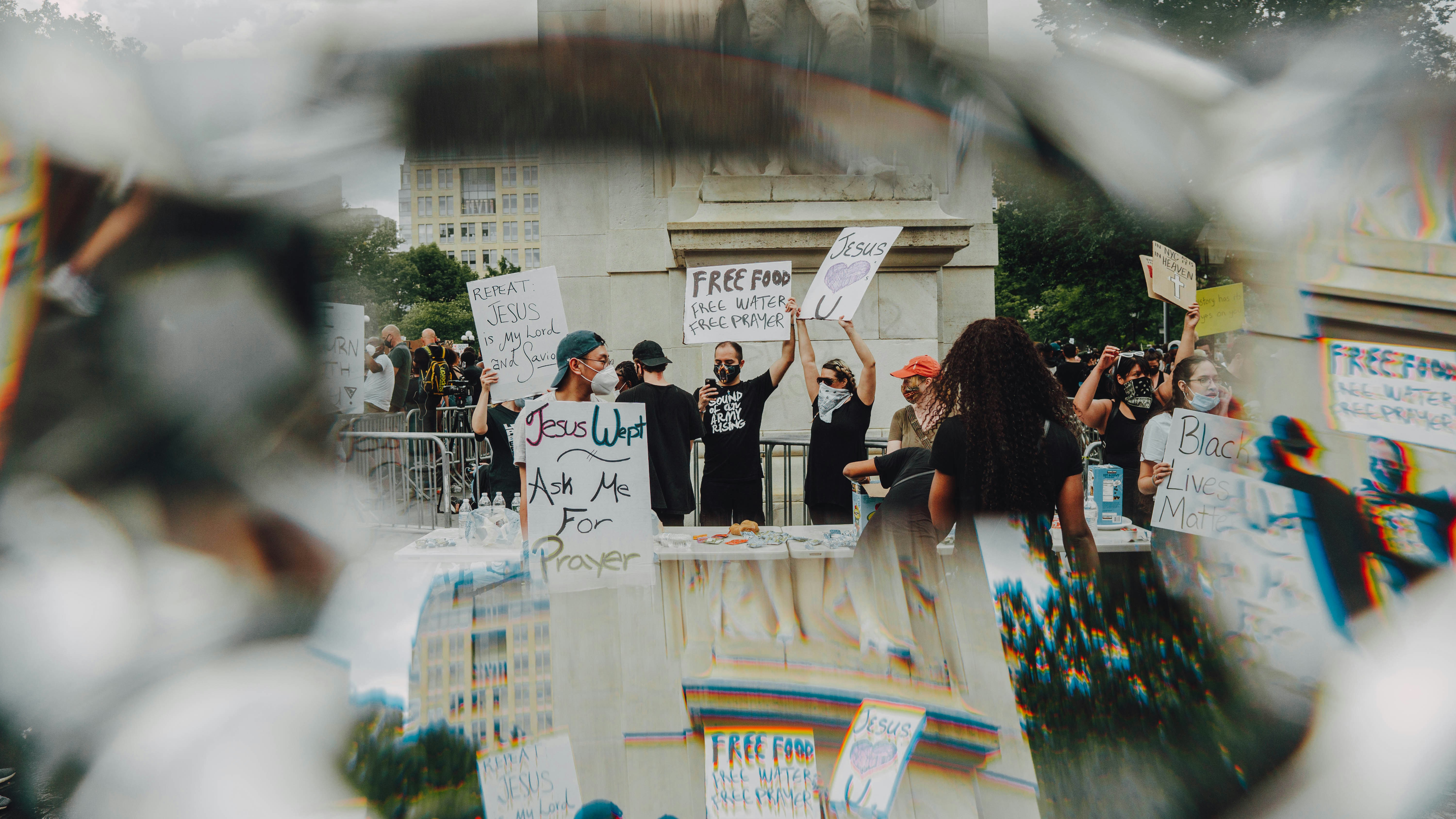A smartphone screen displaying trending hashtags and news headlines related to 'The Kerala Story 2' and alleged conversions, with various news outlet logos visible.