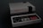 A classic gray gaming console with a matching controller on a dark surface. The console features a front-loading cartridge slot and two controller ports, while the controller has a D-pad and red buttons.