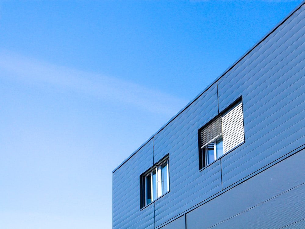 white concrete building under blue sky during daytime