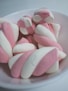 pink and white towel on white ceramic plate