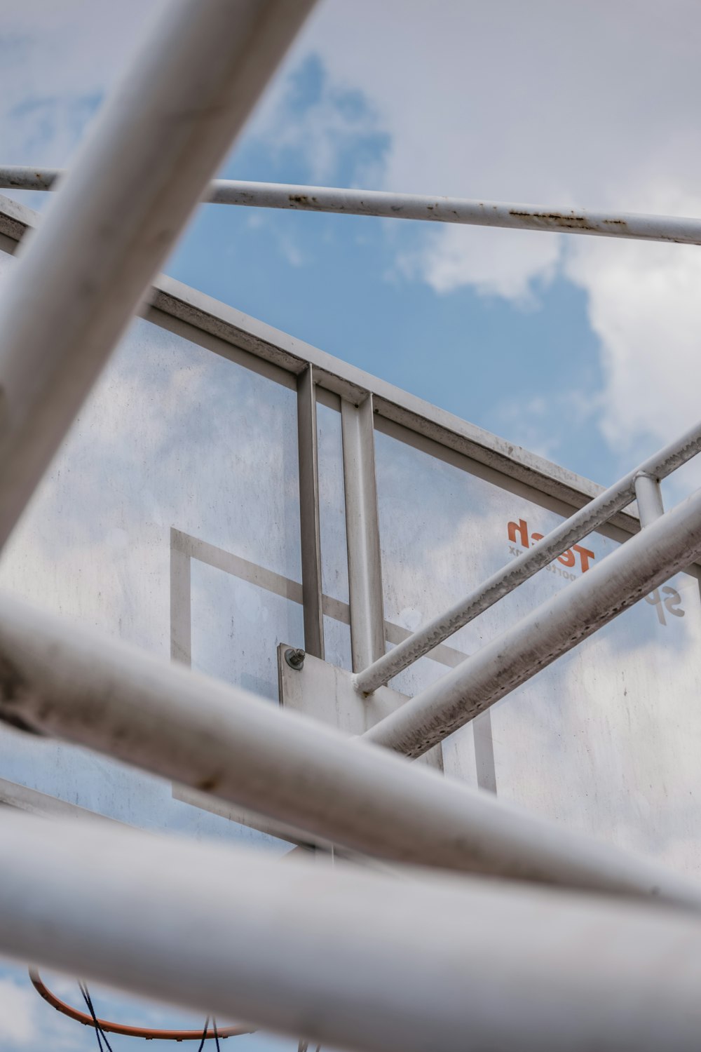 white metal railings under blue sky during daytime