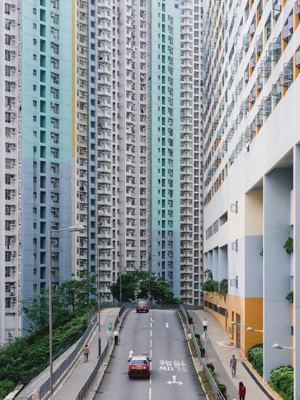 white concrete building beside road during daytime