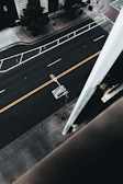 A close-up of a clean, well-maintained urban street with clear markings.