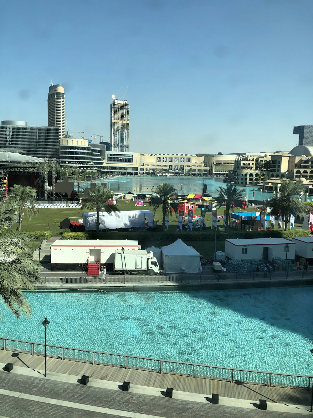 white and red boat on swimming pool during daytime