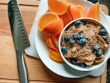 A man preparing a healthy breakfast with fresh ingredients to start his wellness routine