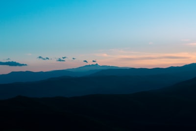 birds flying over the mountains during daytime armenia zoom background