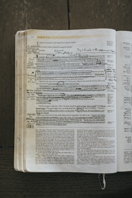 An open missal with highlighted liturgical readings.