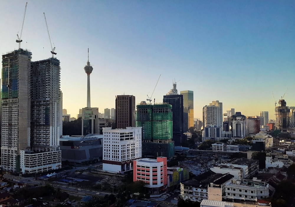 city skyline under blue sky during daytime