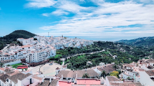 aerial view of city buildings during daytime in Frigiliana Spain