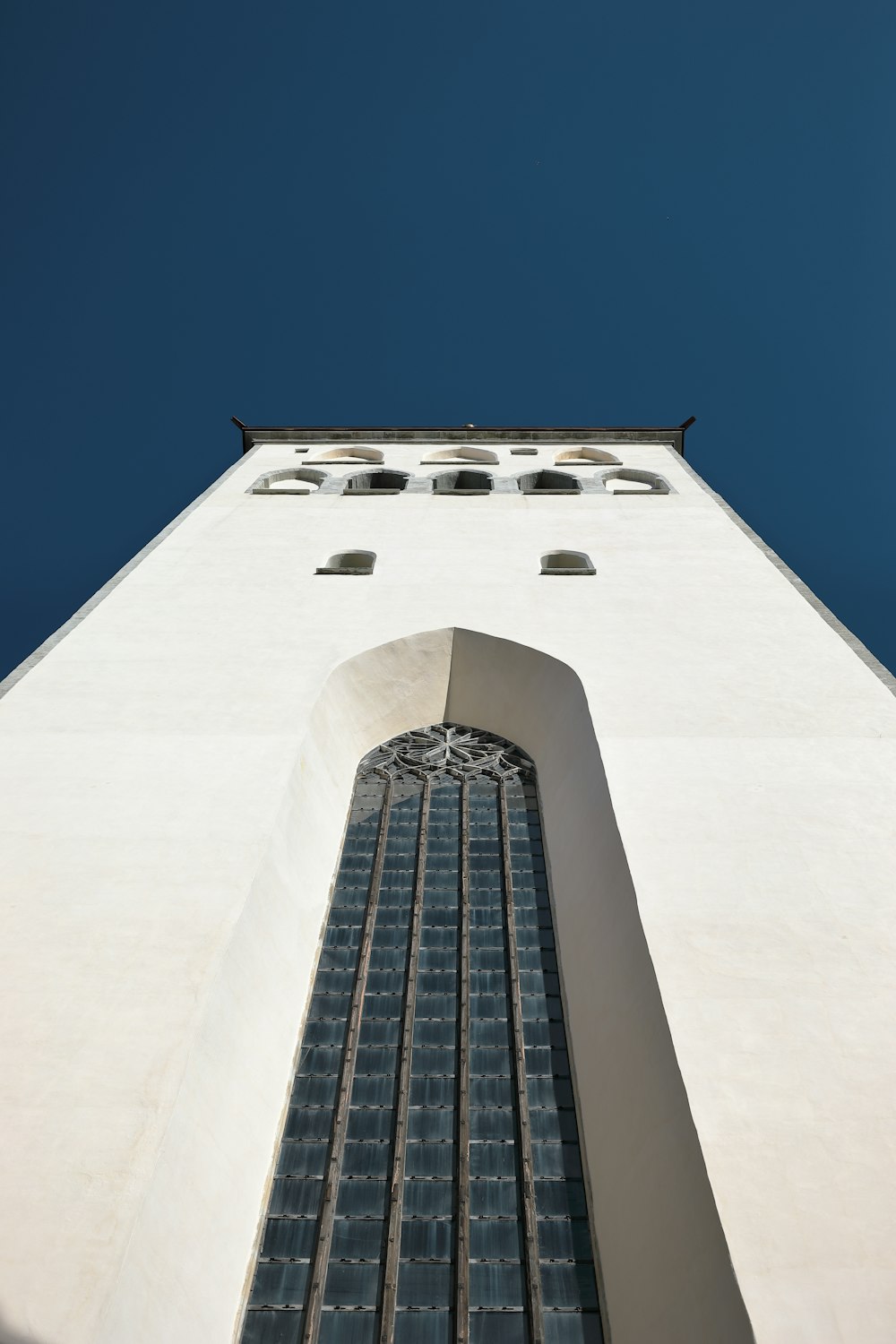 white concrete building under blue sky during daytime