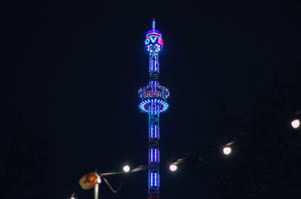 black and white tower during night time