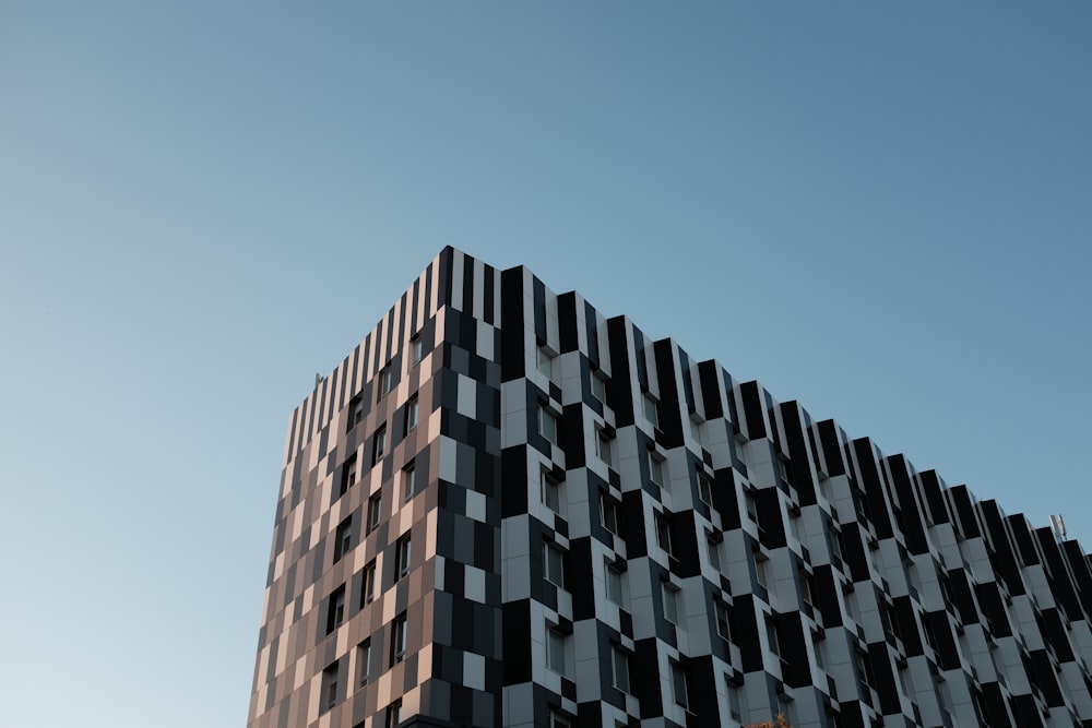 brown concrete building under blue sky during daytime