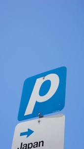 A close-up of a parking sign indicating available spaces.