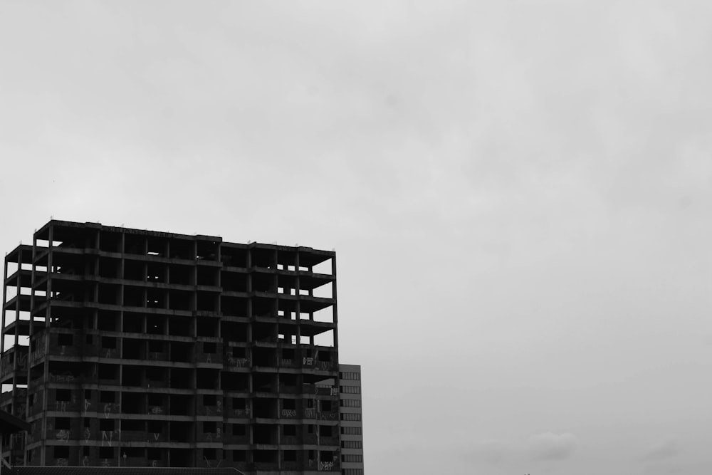 grayscale photo of high rise building