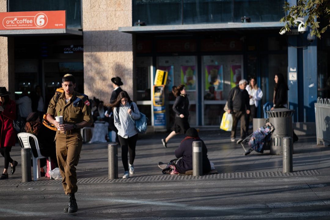 people walking on pedestrian lane during daytime