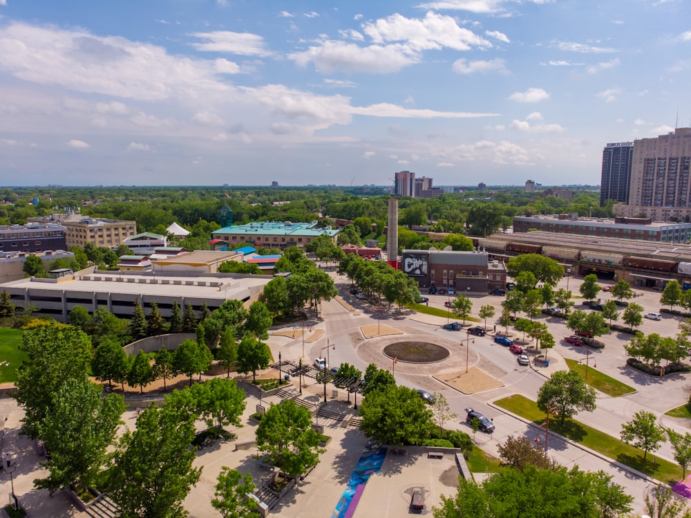 aerial view of green trees and buildings during daytime