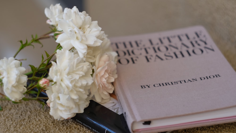 white flowers on book page