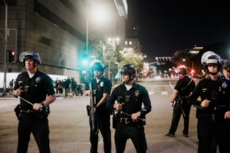 Group of disciplined police officers standing in formation during a training exercise